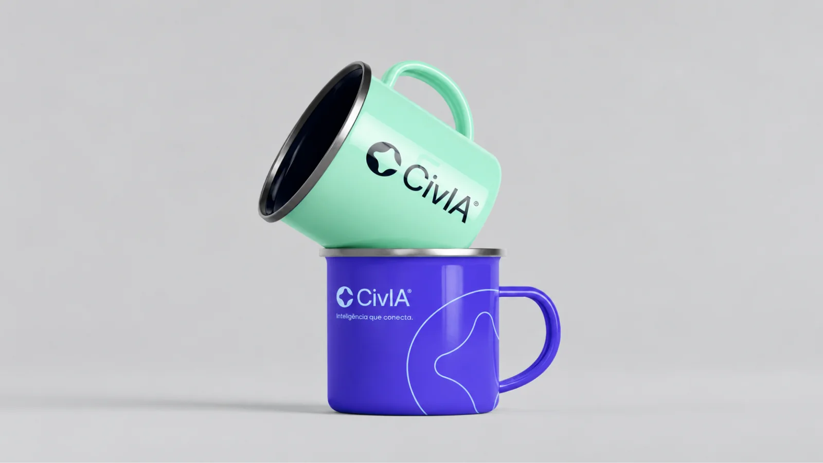 Two stacked enamel mugs in Celadon and Medium Slate Blue with the Civia wordmark